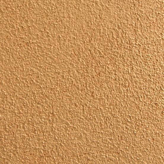 Intonachino Fine Veiled finish close-up in a warm terracotta-orange textured tone